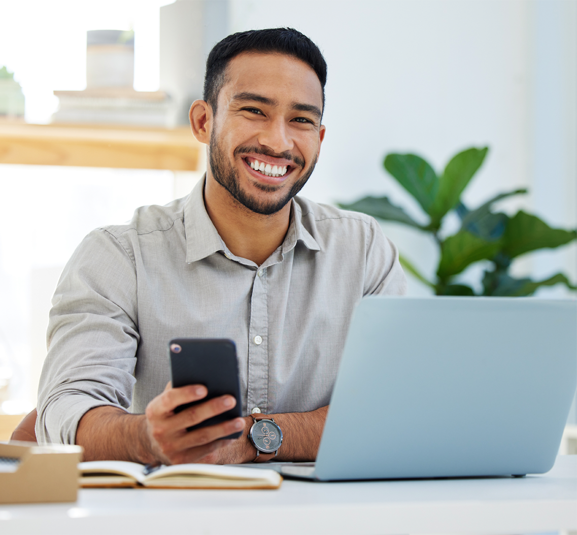 Happy Man on a Computer